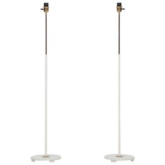 A pair of white floor lamps by ASEA in Sweden