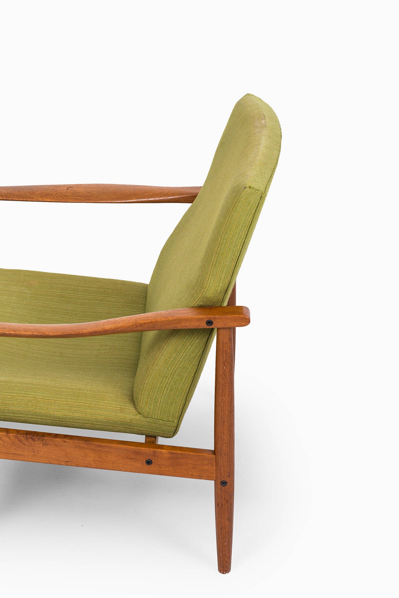 Danish Mid century pair of easy chairs in teak probably produced in Denmark