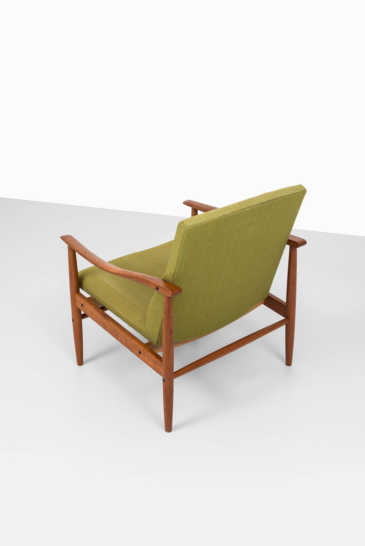 Mid-20th Century Mid century pair of easy chairs in teak probably produced in Denmark