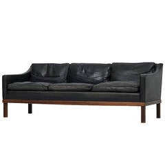 Ib Kofod-Larsen leather sofa by OPE in Sweden