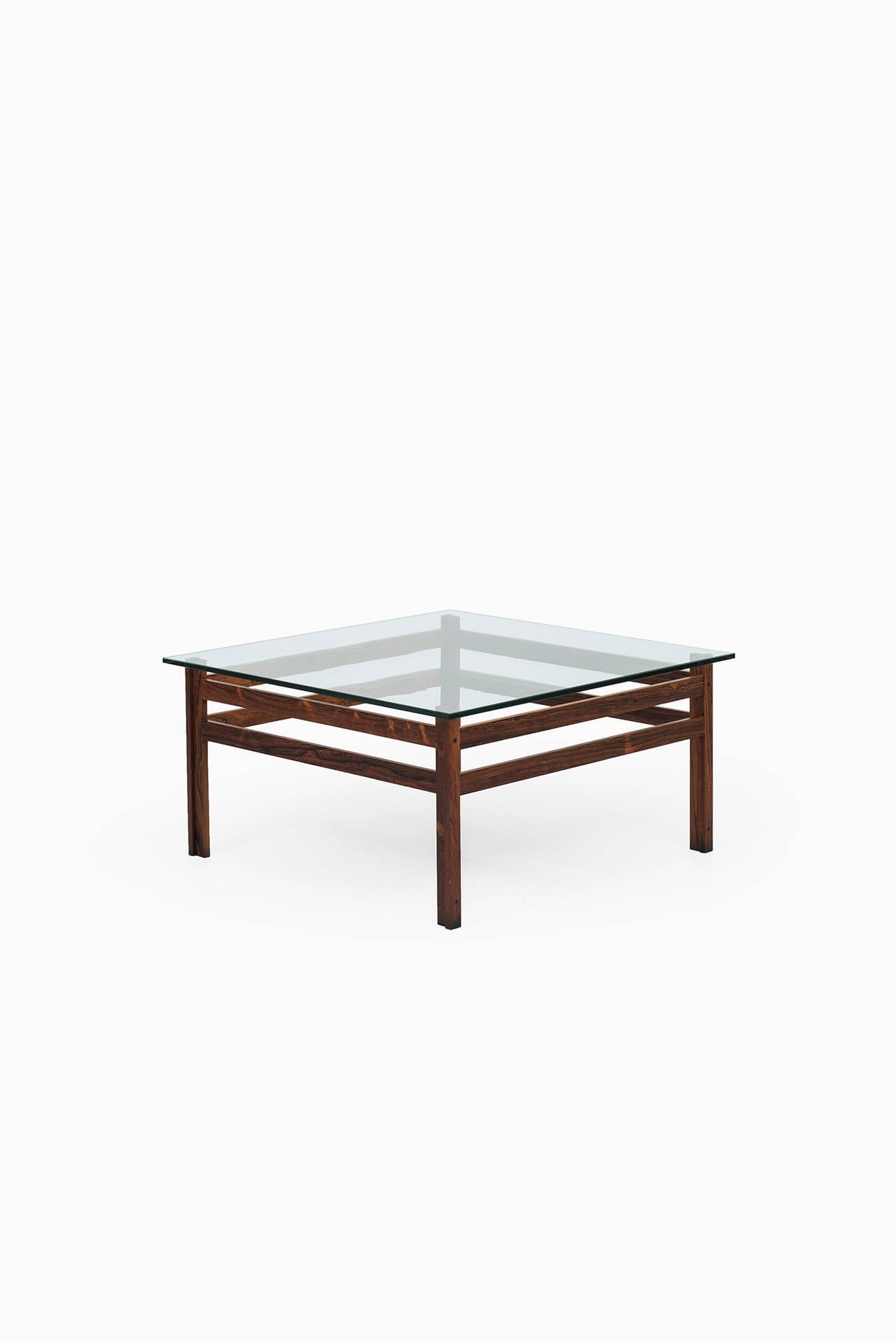 Mid century coffee table in rosewood with thick glass top 1