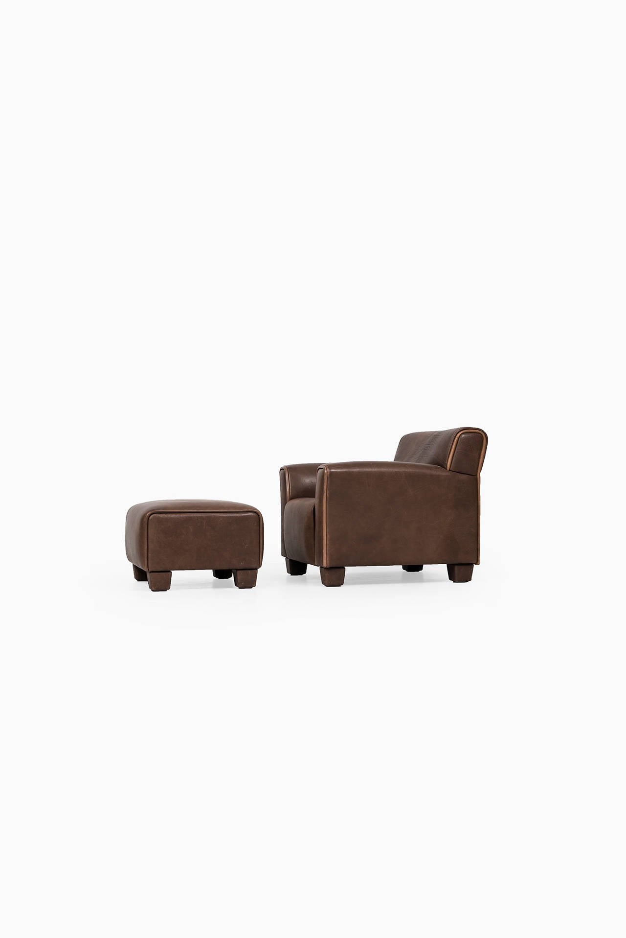 Swiss de Sede easy chair with stool by de Sede in Switzerland