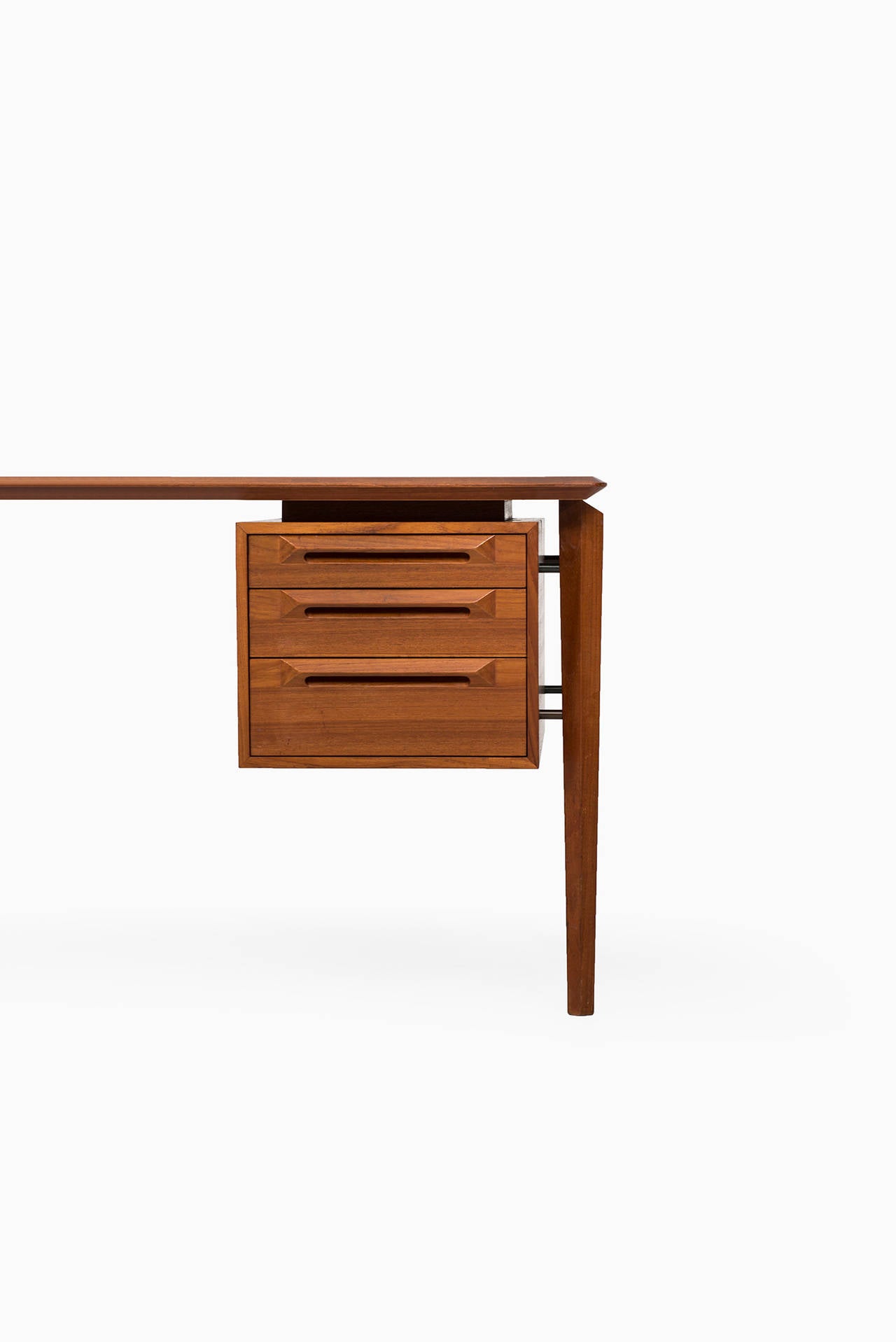 Very rare Ib Kofod-Larsen desk in teak. Produced by Seffle Möbelfabrik in Sweden. A pair is available