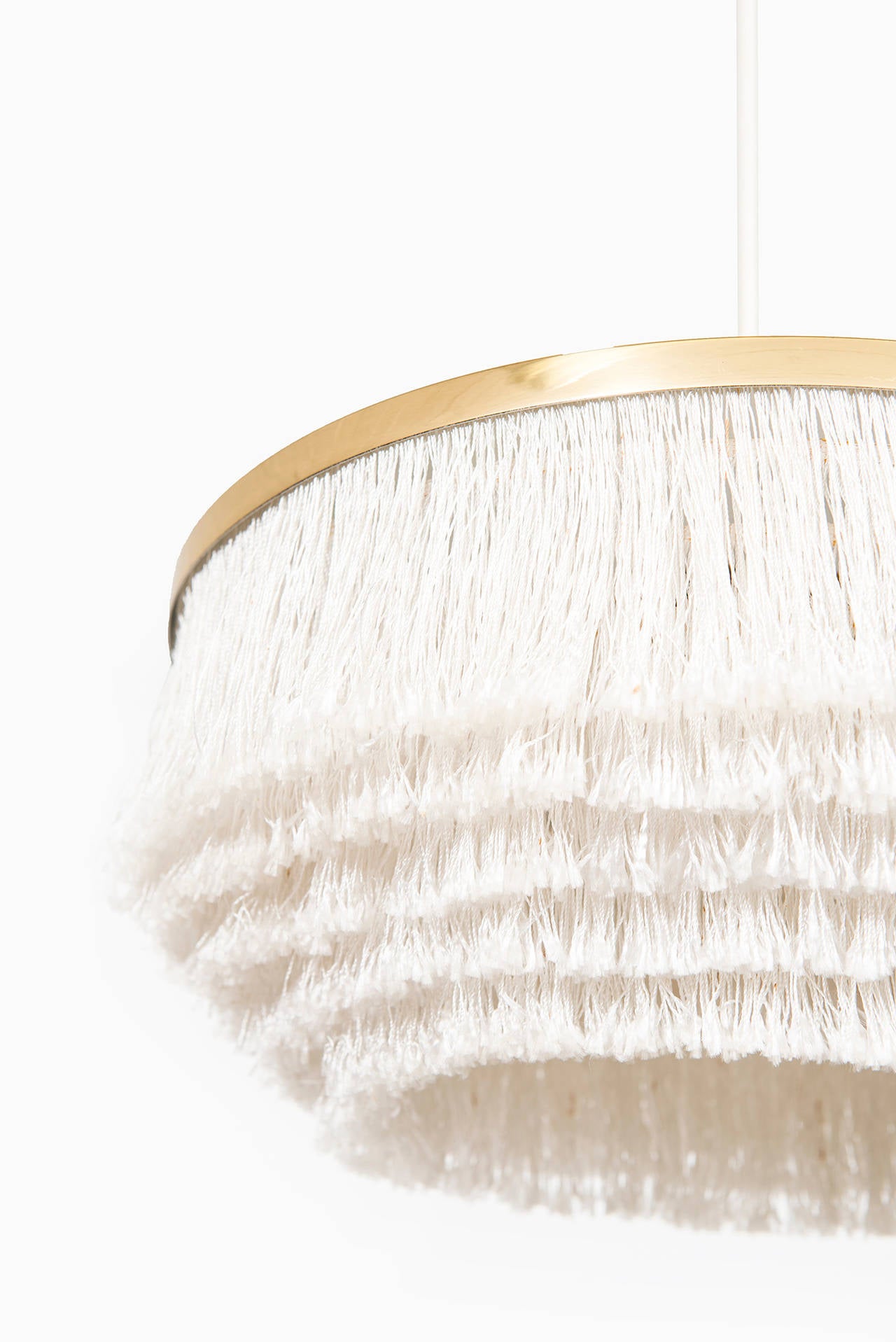 Ceiling lamp in brass and white fabric designed by Hans-Agne Jakobsson. Produced by Hans-Agne Jakobsson in Markaryd, Sweden.