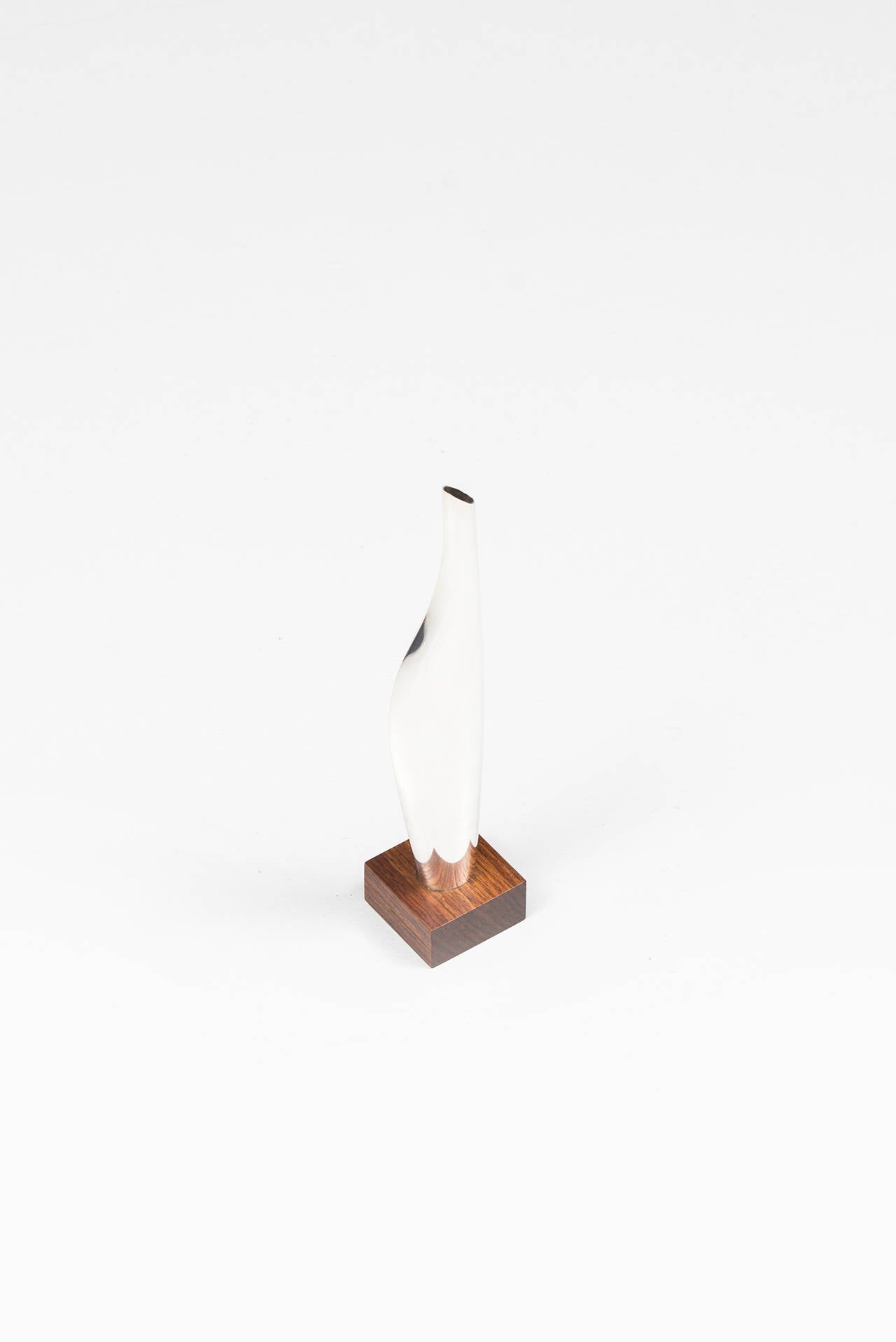 Sterling silver on rosewood base model TW17 designed by Tapio Wirkkala. Produced in Finland.