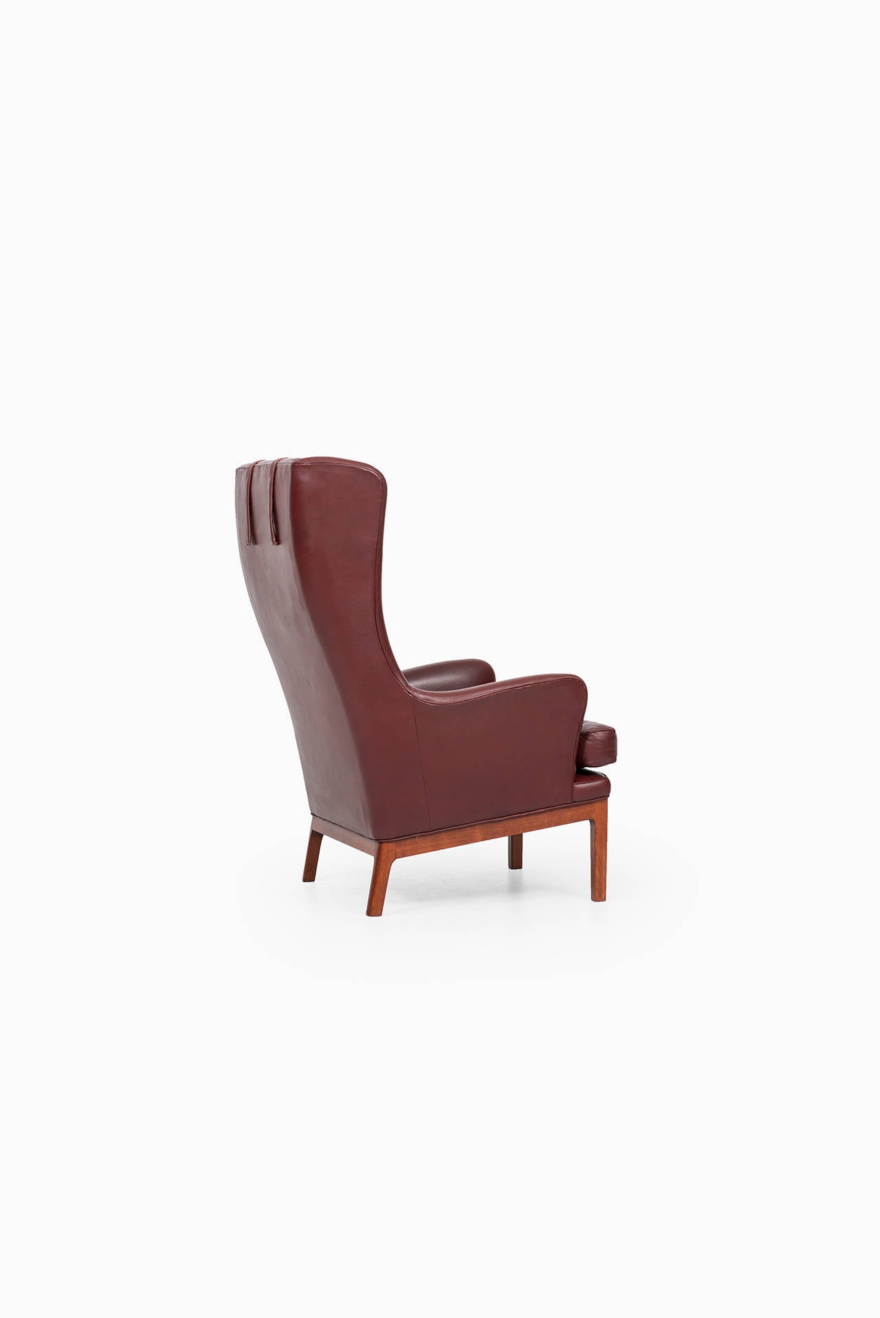 Beech Arne Norell Wingback Easy Chairs in Dark Red Leather by Norell AB in Sweden