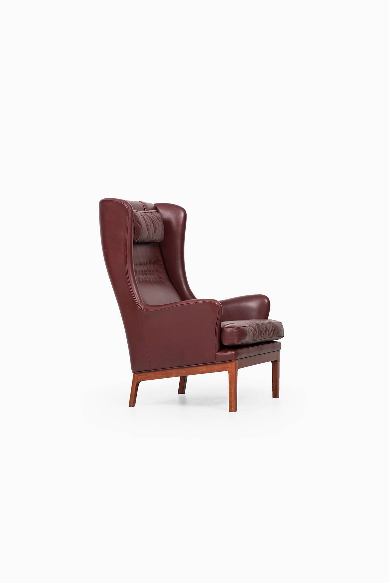 Arne Norell Wingback Easy Chairs in Dark Red Leather by Norell AB in Sweden 2