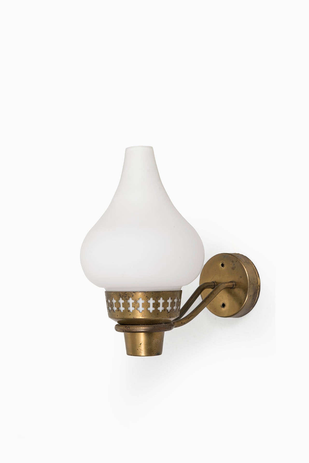 Rare set of 4 wall lamps in brass and white opal glass produced by ASEA In Sweden.