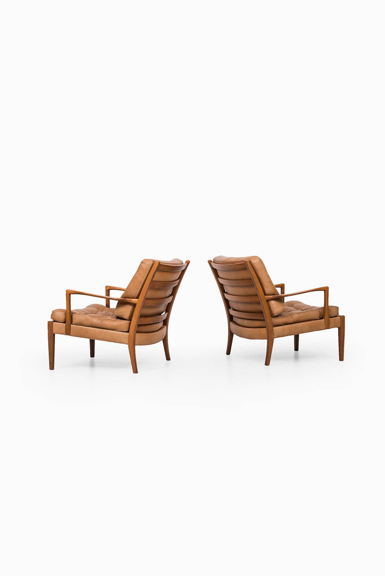 Arne Norell Easy Chairs Model Löven in Cognac Brown Buffalo Leather