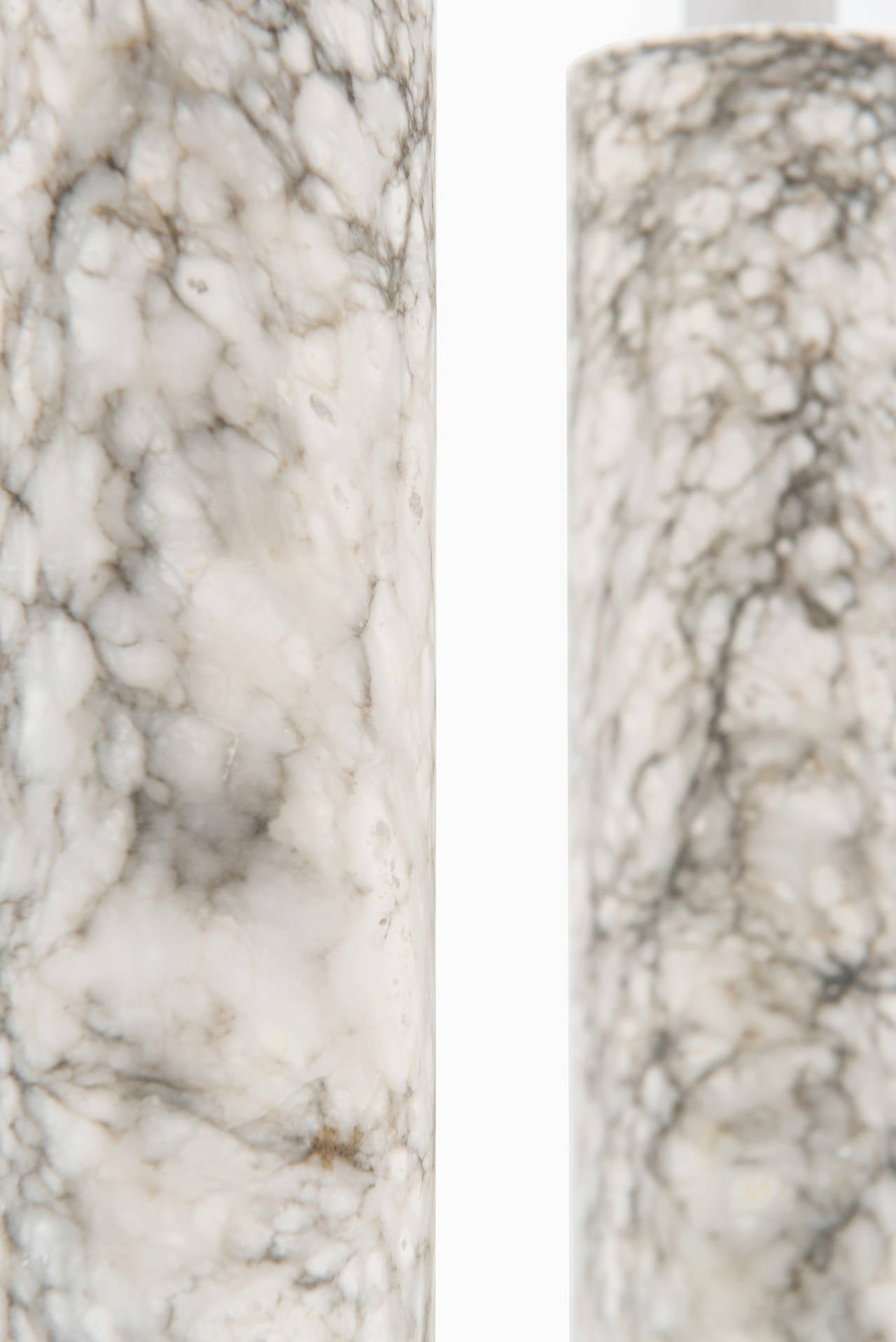 A pair of marble table lamps. Produced in Italy. Please note: We’re selling these without any lamp shades.
