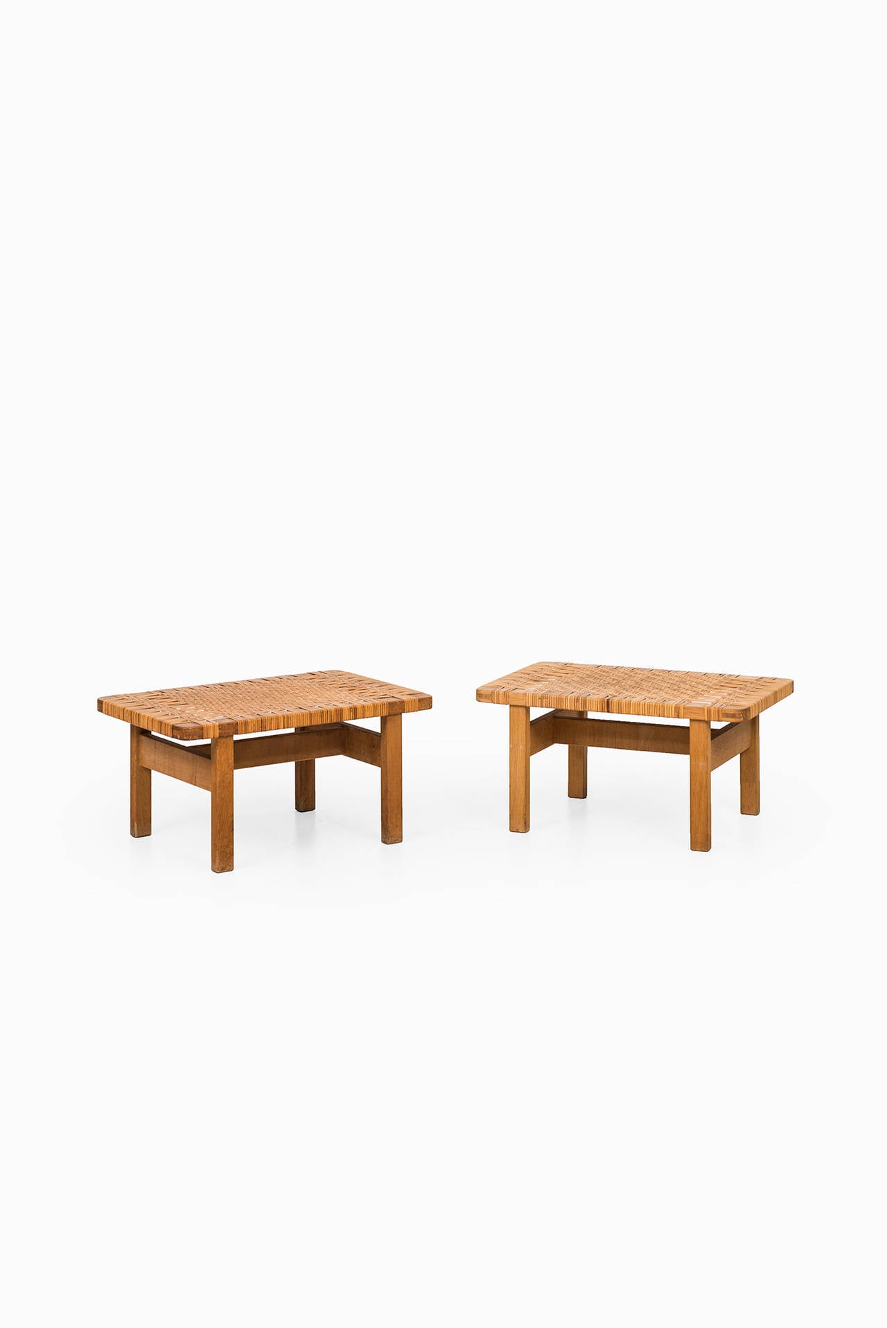 Rare pair of side tables in oak and woven cane designed by Børge Mogensen. Produced by Frederica Stolefabrik in Denmark.