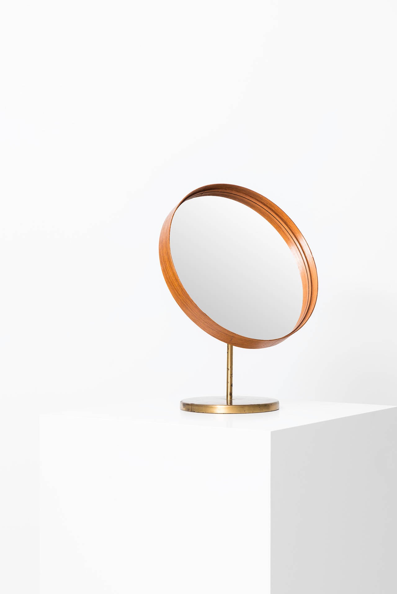 Rare table mirror in teak and brass produced by Glasmäster in Markaryd, Sweden.