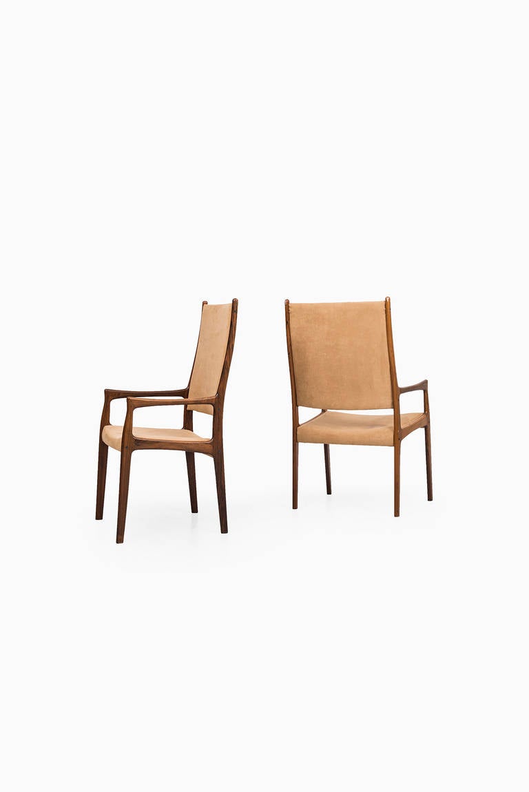 Johannes Andersen Dining Chairs In Rosewood by Mogens Kold in Denmark 2