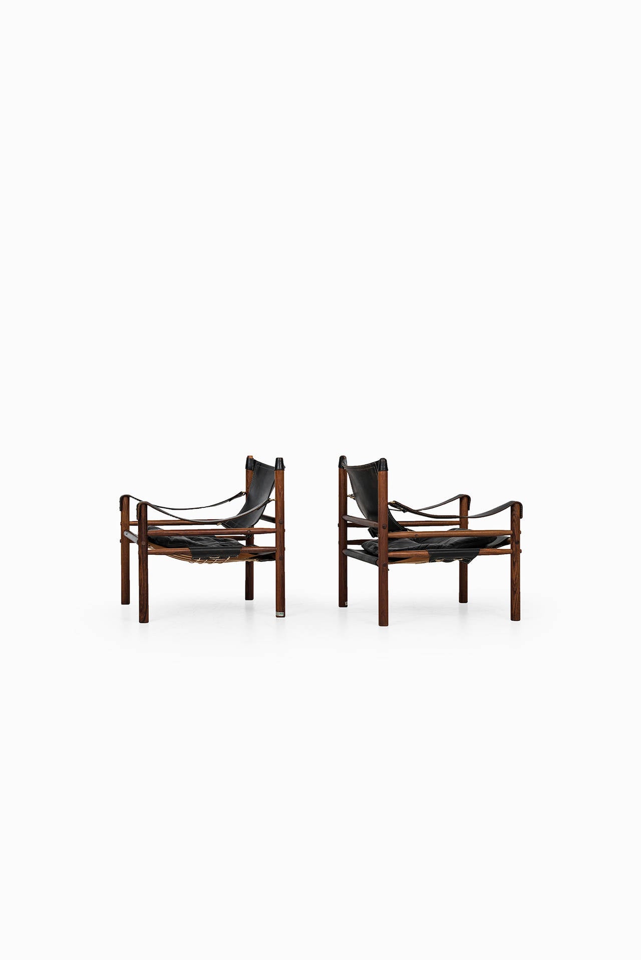 Swedish Arne Norell Sirocco Easy Chairs in Rosewood and Black Leather