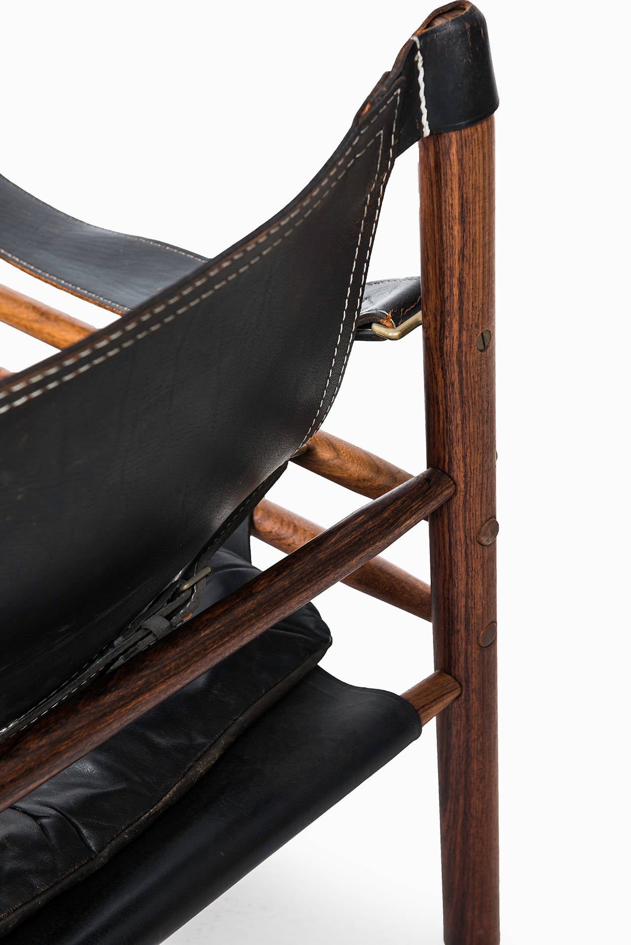 Brass Arne Norell Sirocco Easy Chairs in Rosewood and Black Leather