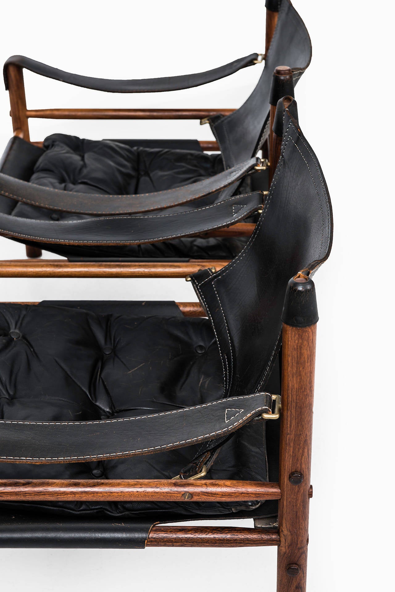 Arne Norell Sirocco Easy Chairs in Rosewood and Black Leather 1