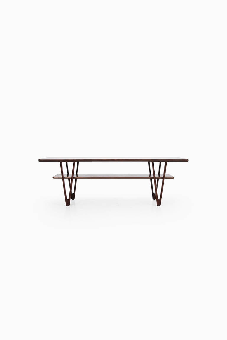 Rare Nanna Ditzel coffee table in rosewood. Produced by Poul Kolds Savværk in Denmark.