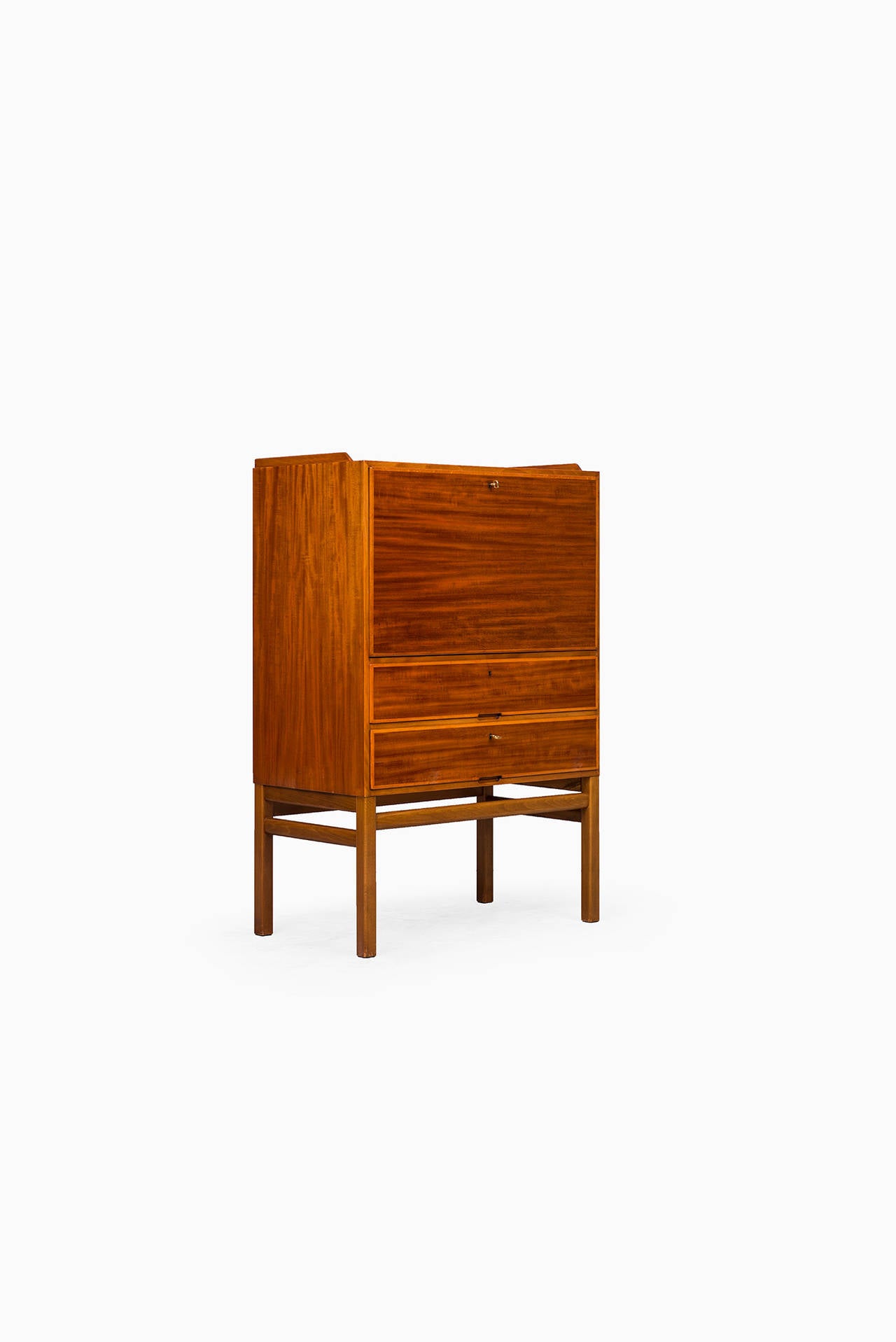 Rare Axel Larsson cabinet / secretaire with flip-down desk in mahogany and beech. Produced by Bodafors in Sweden.