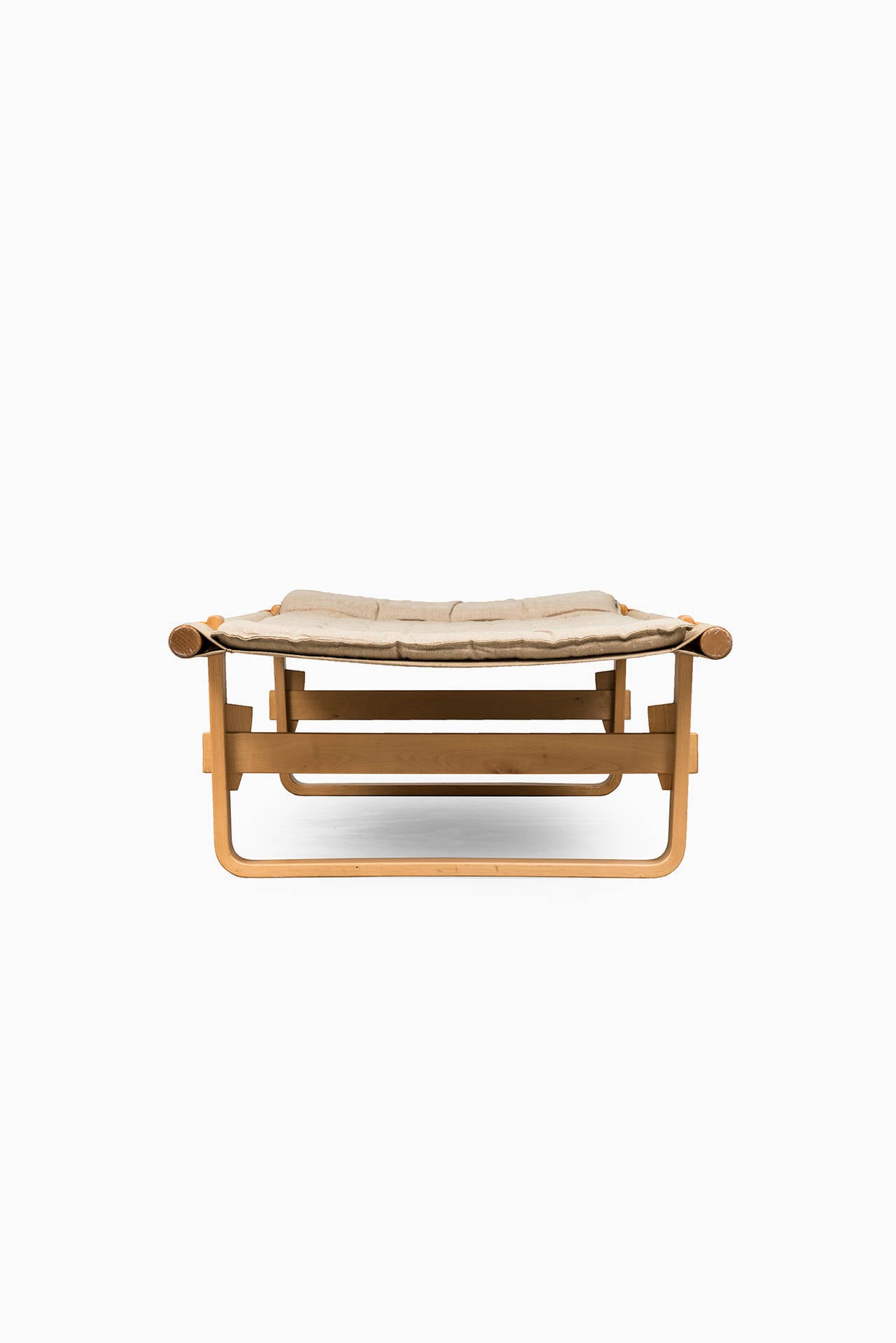 Retro daybed in birch bentwood and beige canvas with brown leather details. Probably produced in Sweden.