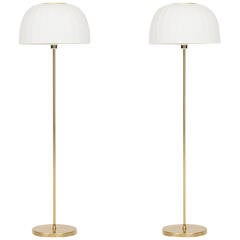 Hans-Agne Jakobsson floor lamps in brass produced in Sweden