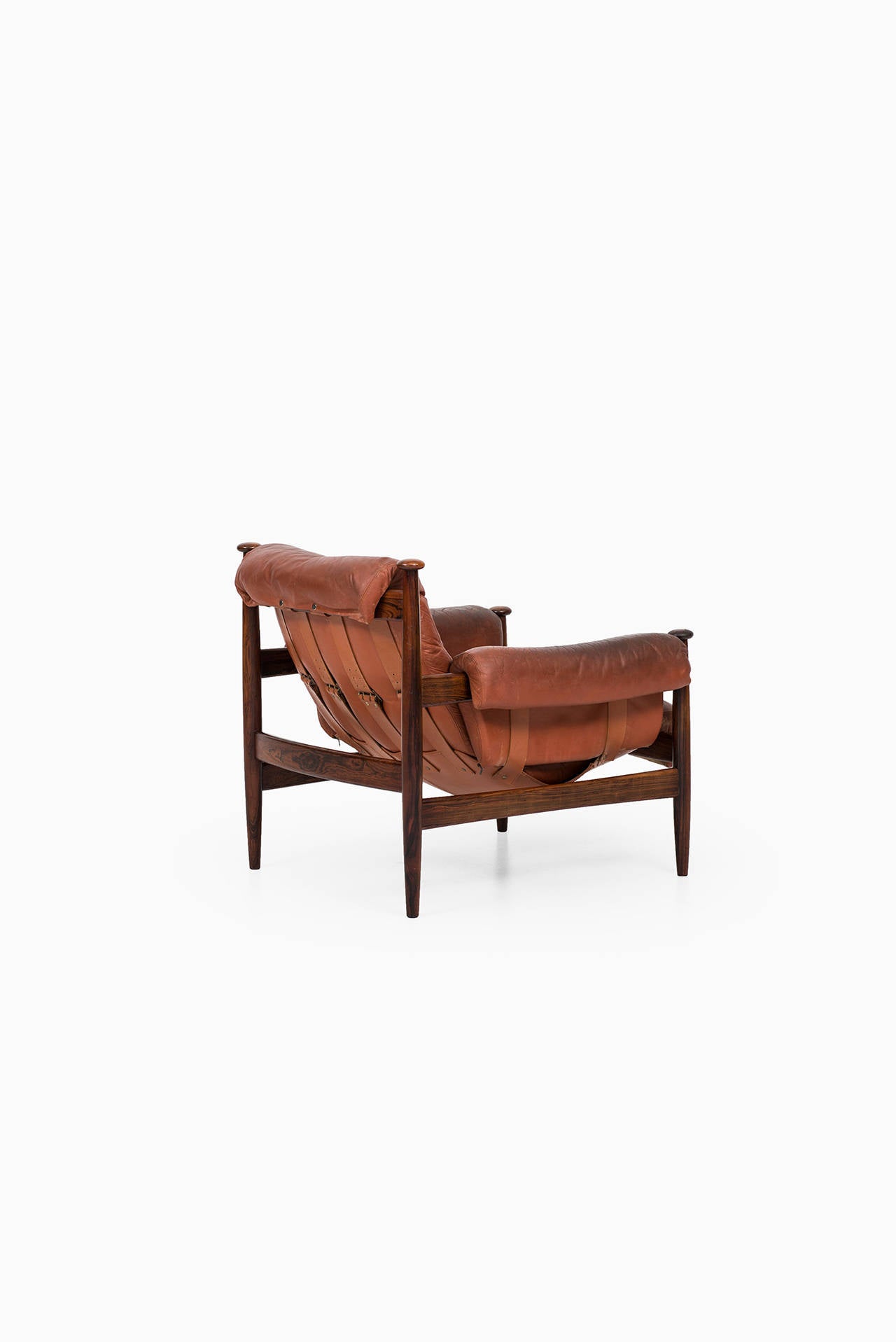 Rare safari chair in rosewood and red leather. Produced by Ire Möbler in Skillingaryd, Sweden