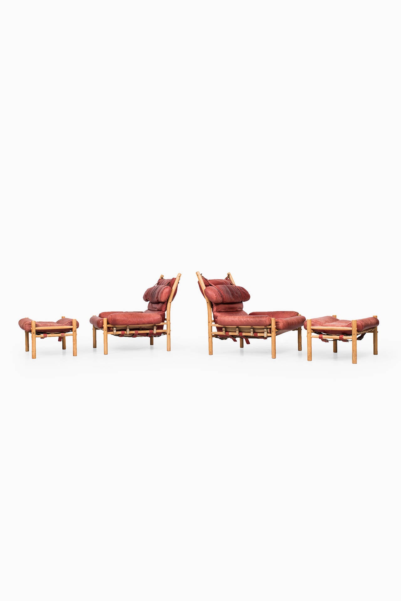 Mid-Century Modern Arne Norell Inca easy chairs with stools produced by Arne Norell in Sweden