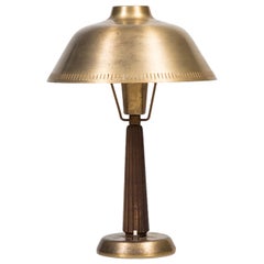 Hans Bergström table lamp in teak and brass by ASEA in Sweden