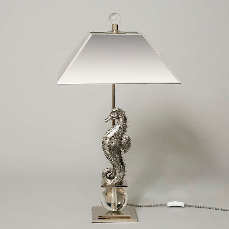 unusual Table lamp chrome sea horse sitting on crystal ball.
new designed  with chrome fitting
Lamp shade in silver
one of a kind
total height 60 cm