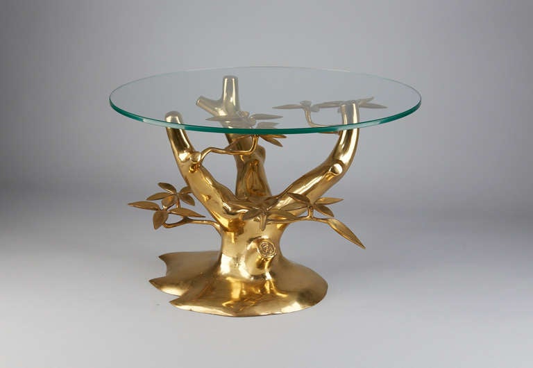 Beautiful organic tree form cocktail or side table attributed to Willy Daro<br />
Measurement includes  glass top