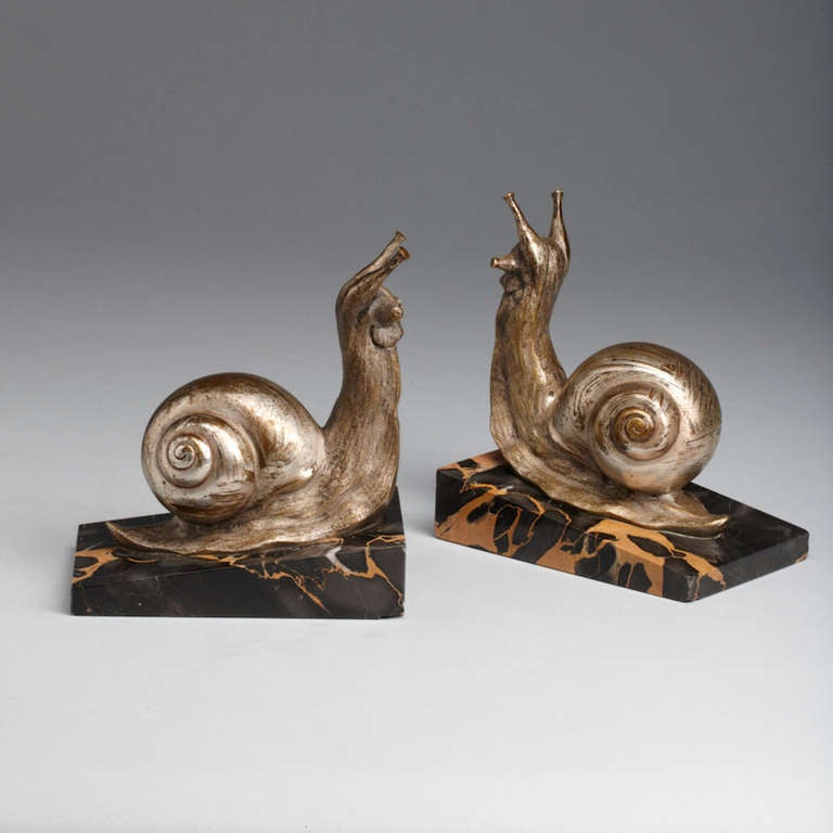 unusual Bookends  bronze on marble base signed S.Bizard
