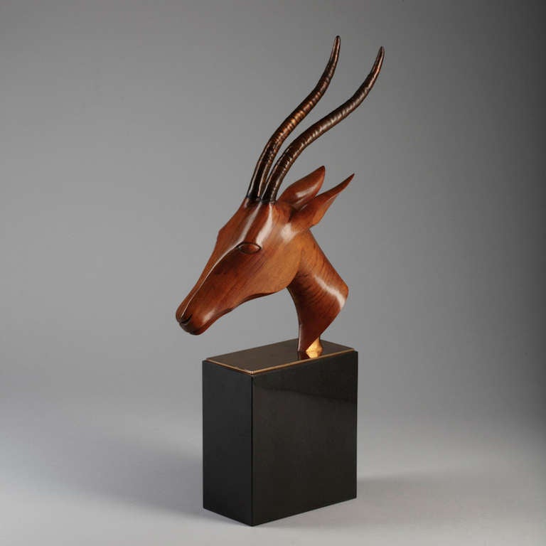 Antelope Head  on Marble Base
Hoenig worked for  the Hagenauer Werkstätten. He  came to London and established his own workshops. Marks: LAHO London Made in England and the Hoenig monogram.
signed Laho London  
Total height  55 cm