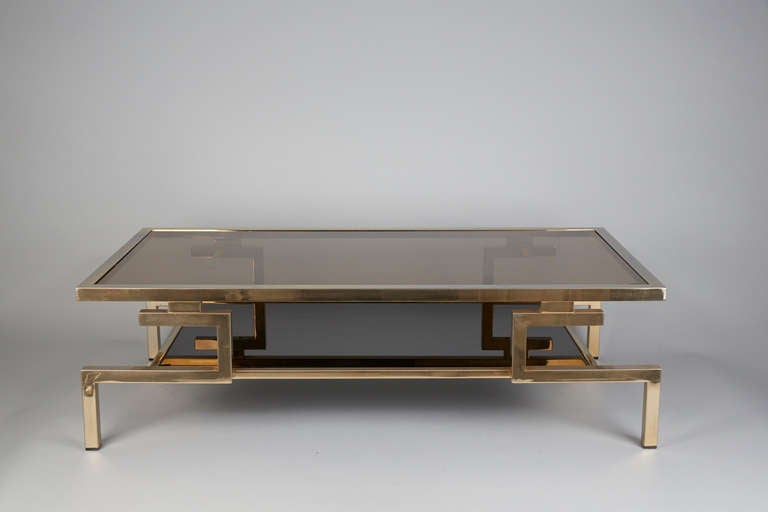 Double level cocktail table by Guy Lefevre.
Original smoked glass on both levels.