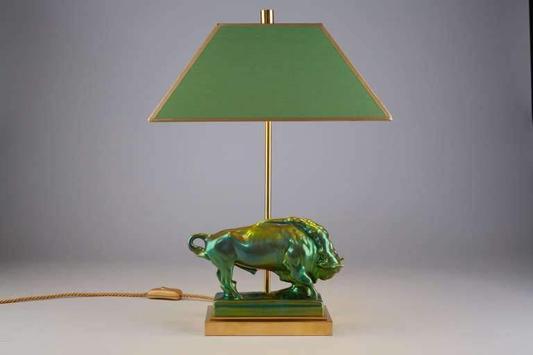 Vintage Zsolnay figurine (Zsolnay Porcelain Manufacture of Hungary) of a Taurus green eosin gaze. Newly mounted and wired as a lamp on a brass stand. Lampshade green silk inside gold