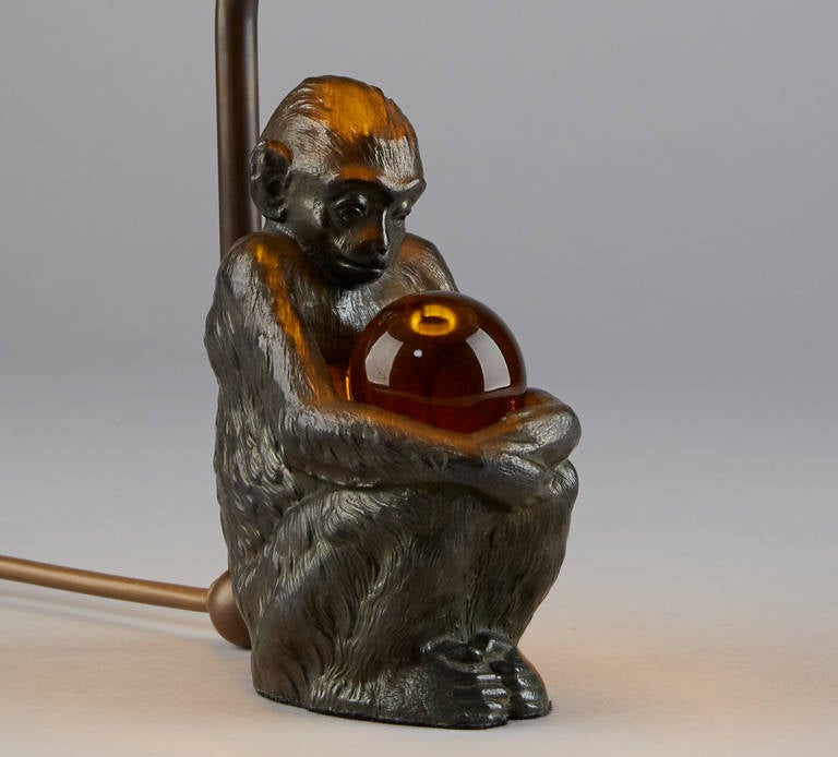 German Table Lamp sitting Monkey with crystal ball For Sale