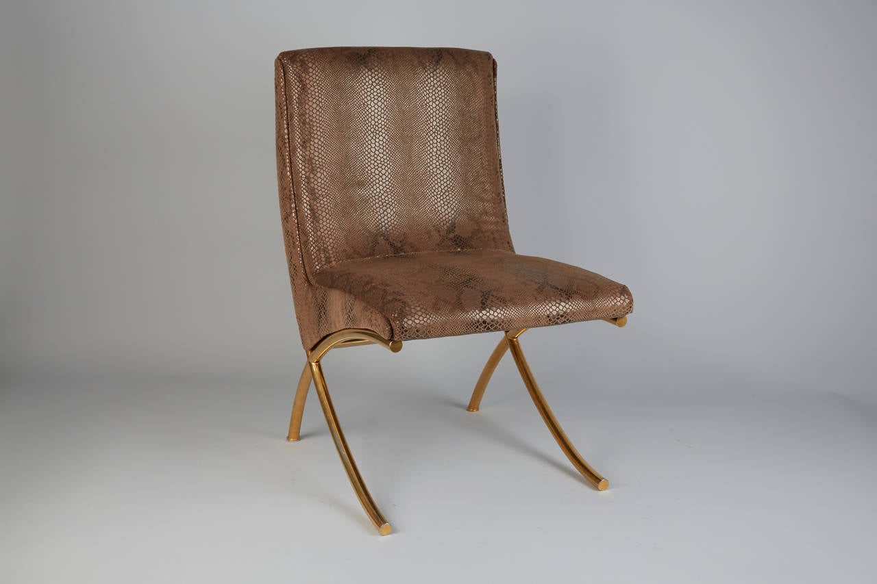 Elegant mid century side chair, legs and frame in brass.
New upholstered with snake skin fabric.
