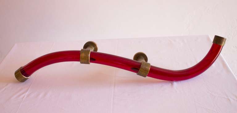 Door Handle in blown Murano Glass vibrant Red color  1950s Italy.
Unique Italian Venetian Murano glass door handle in red color, circa 1950s, with an amazing shape, and with a very particular and refined brass frame with circular drawings.
The door