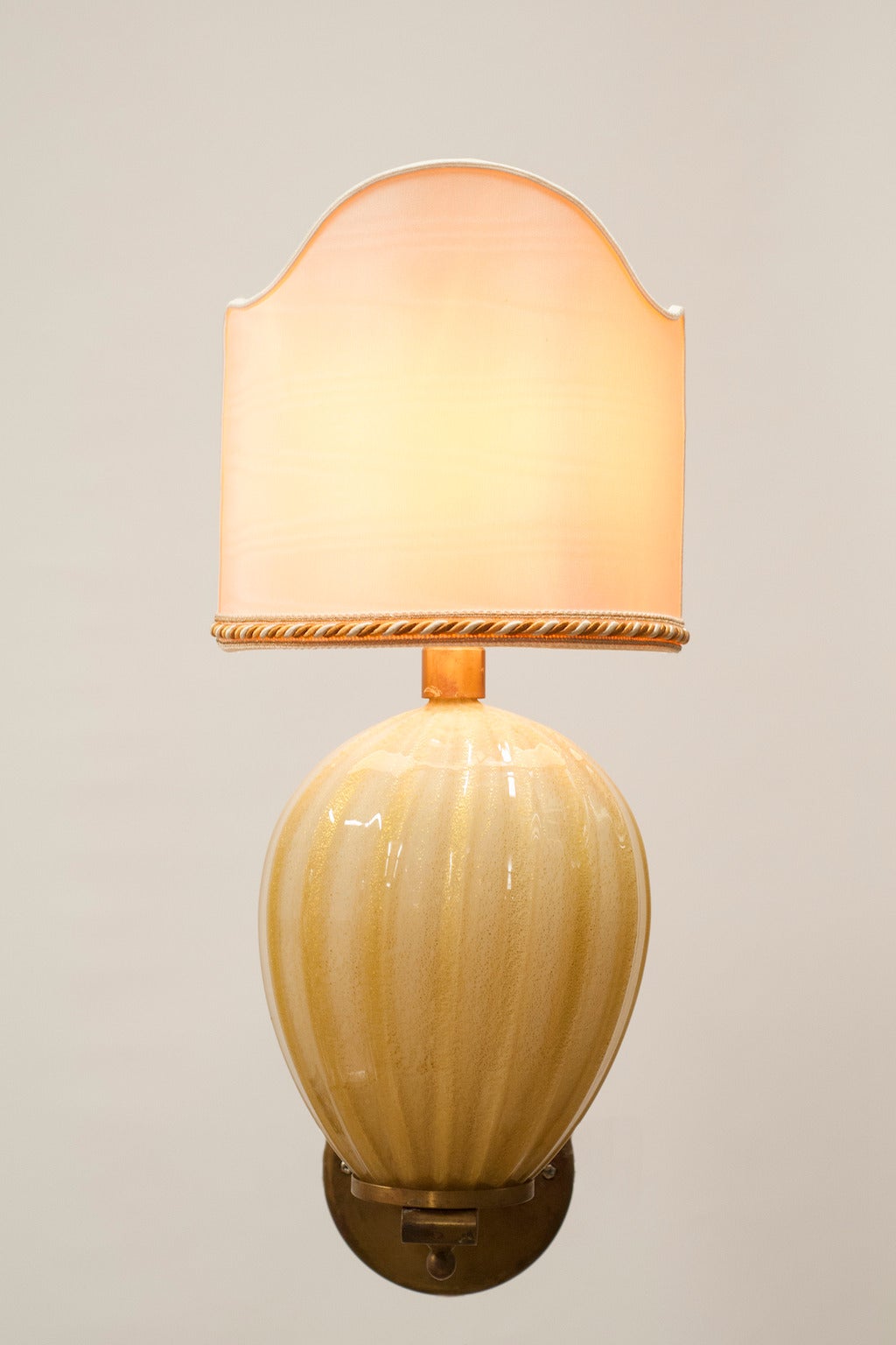 Mid-20th Century  A Pair of Exquisite Murano Glass Sconces in Ivory Hue and Gold Leaf Decoration For Sale