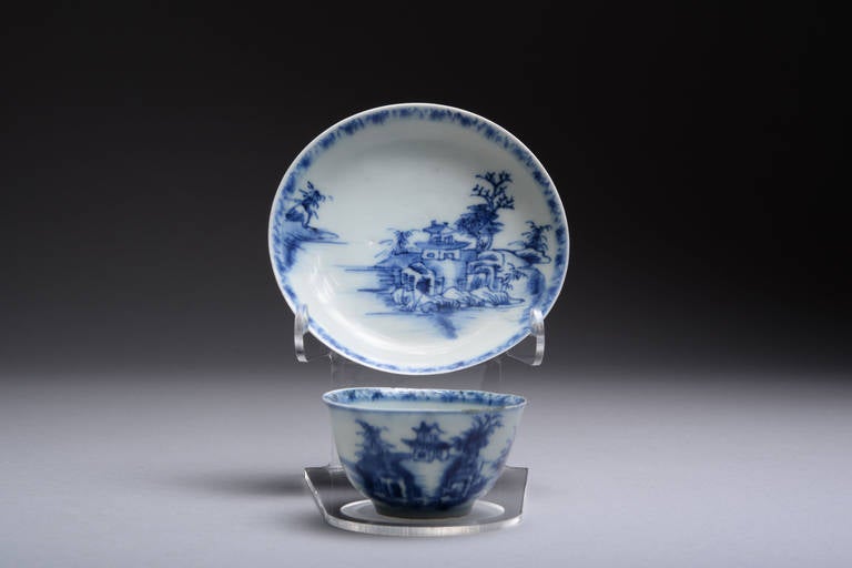 A wonderful, vibrant, Chinese blue on white porcelain teabowl and saucer set, dating to approximately 1750 and from the famous Nanking cargo - officially recorded pieces with Christie's stickers and inventory numbers.

The bowl and saucer are both