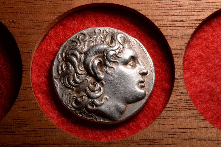 A superb, beautifully preserved ancient silver tetradrachm bearing an exceptional portrait of the deified Alexander the Great, minted under one of Alexander's top generals and successors, King Lysimachos. Minted 299 - 296 BC at the Lampsacos mint,