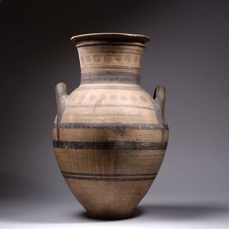 A very large and attractive ancient Cypro-Archaic Iron Age Geometric Amphora, dating to approximately 800 BC.

The piece is of typical Cypro-Archaic form, with ring base, pear-shaped body, short, fat neck with collar, everted lip and bilateral