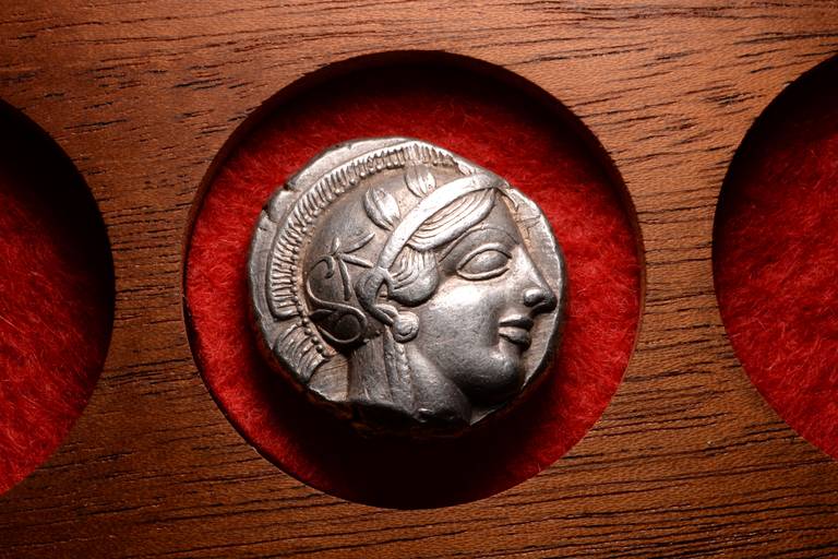 A magnificent, well provenanced example of one of the most iconic and important coin types from the ancient world. A solid silver ancient Greek tetradrachm from Athens, struck circa 454 - 404 BC.

Of the countless examples that exist on the