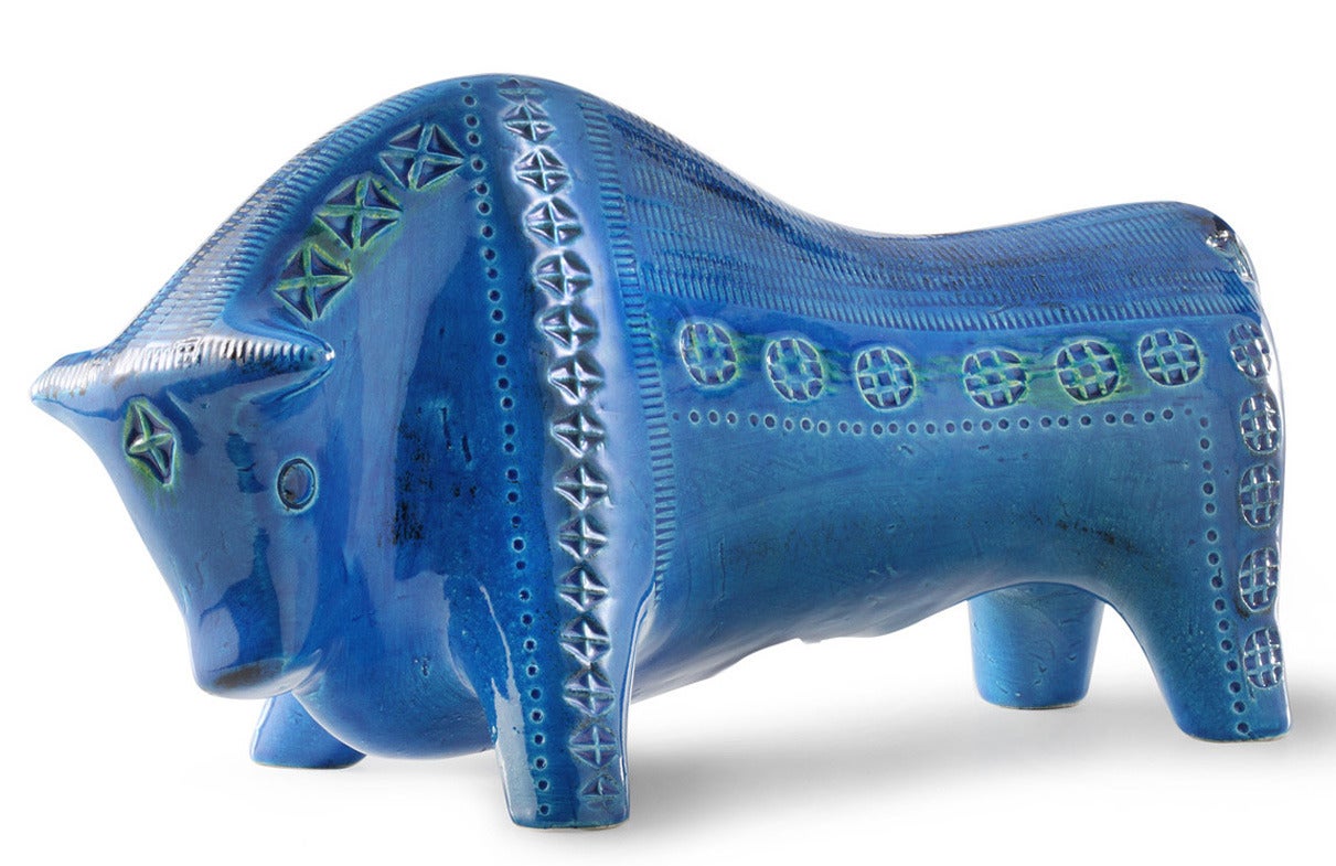 Between 1957 and 1967 Aldo Londi created his famous Rimini Blu ceramic series in this special blue varnish, above 150 different objects.

The Rimini Blu bull is part of the series and produced by Bitossi.