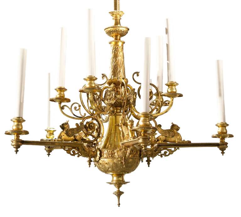 The late 19th century and early 20th century are the fitting periods for an eclectic style. This chandelier is a perfect example of that alliance combining several vocabularies: Regency, Classical, and Empire. Simultaneously, the development of this
