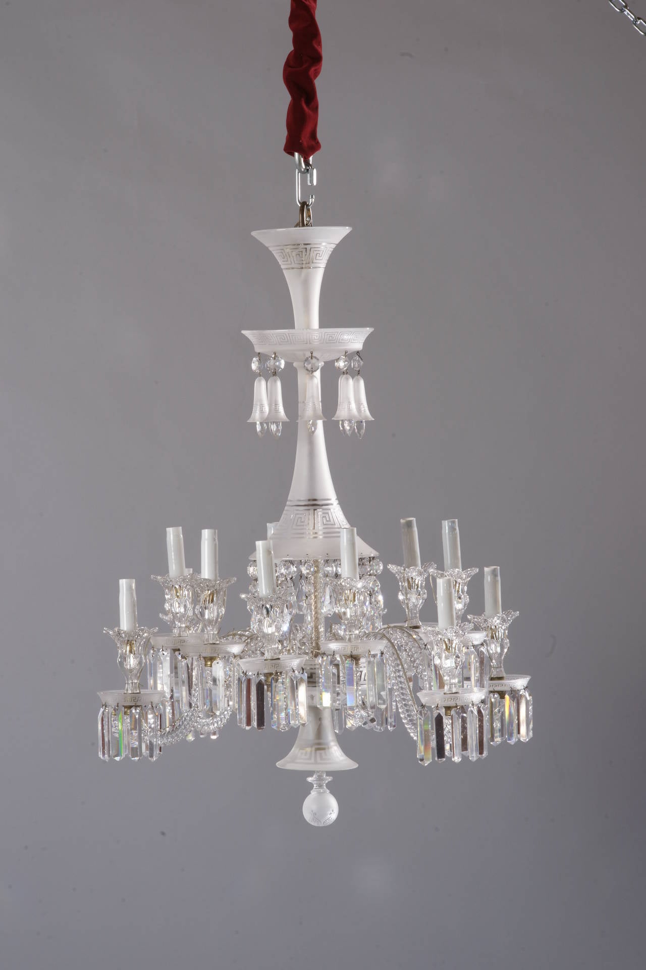 A fine neoclassical twelve-light crystal chandelier by Baccarat.