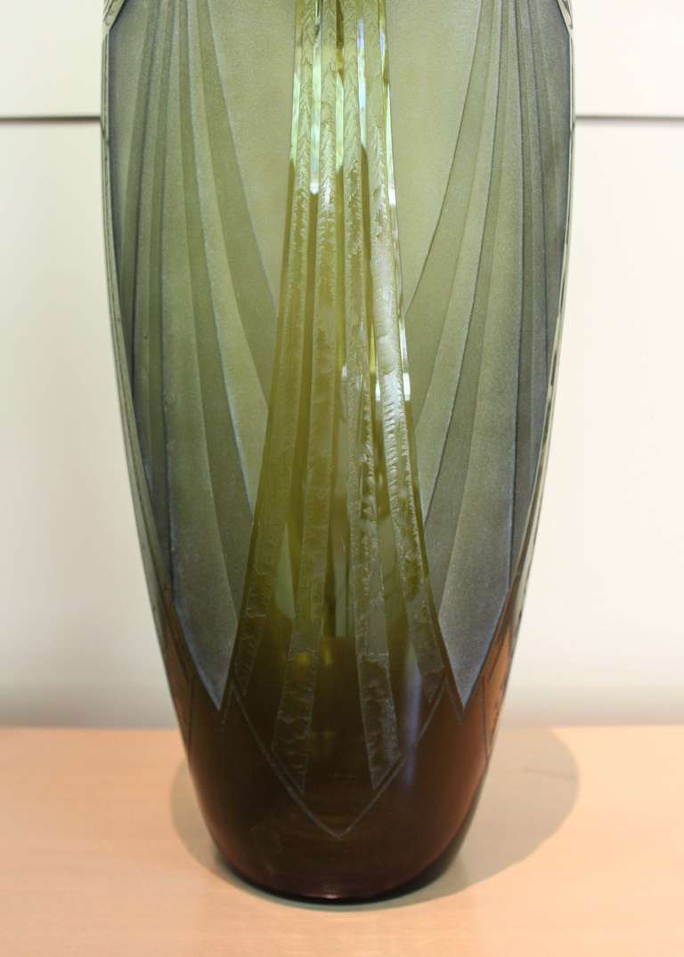 Etched glass, emerald-green vase by Legras of St. Denis, France. Best known for their original Art Deco designs, this large vase is an excellent example of the maker's forte. Excellent condition, signed.

circa 1910.

22