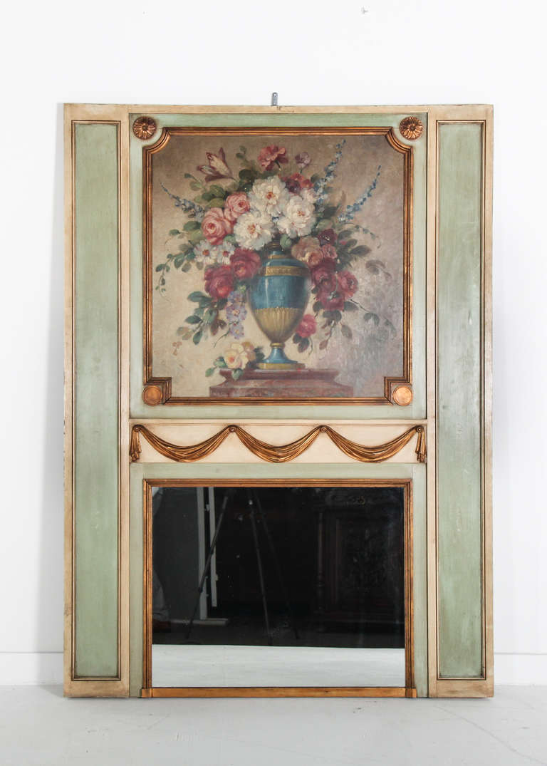 Ca. 1910

Early 20th Century French trumeau mirror with hand-painted floral motif and gilt accents, sourced in Paris, France. All original condition, a perfect unexpected piece to compliment almost any design scheme.

70