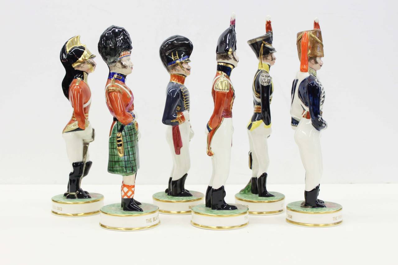 Set of six hand-painted porcelain interpretation of, circa 1800 English regimental soldiers by the famous deco pottery designer, Clarice Cliff (1899-1972). Beautifully rendered with exquisite detail, in near perfect condition, probably made in the