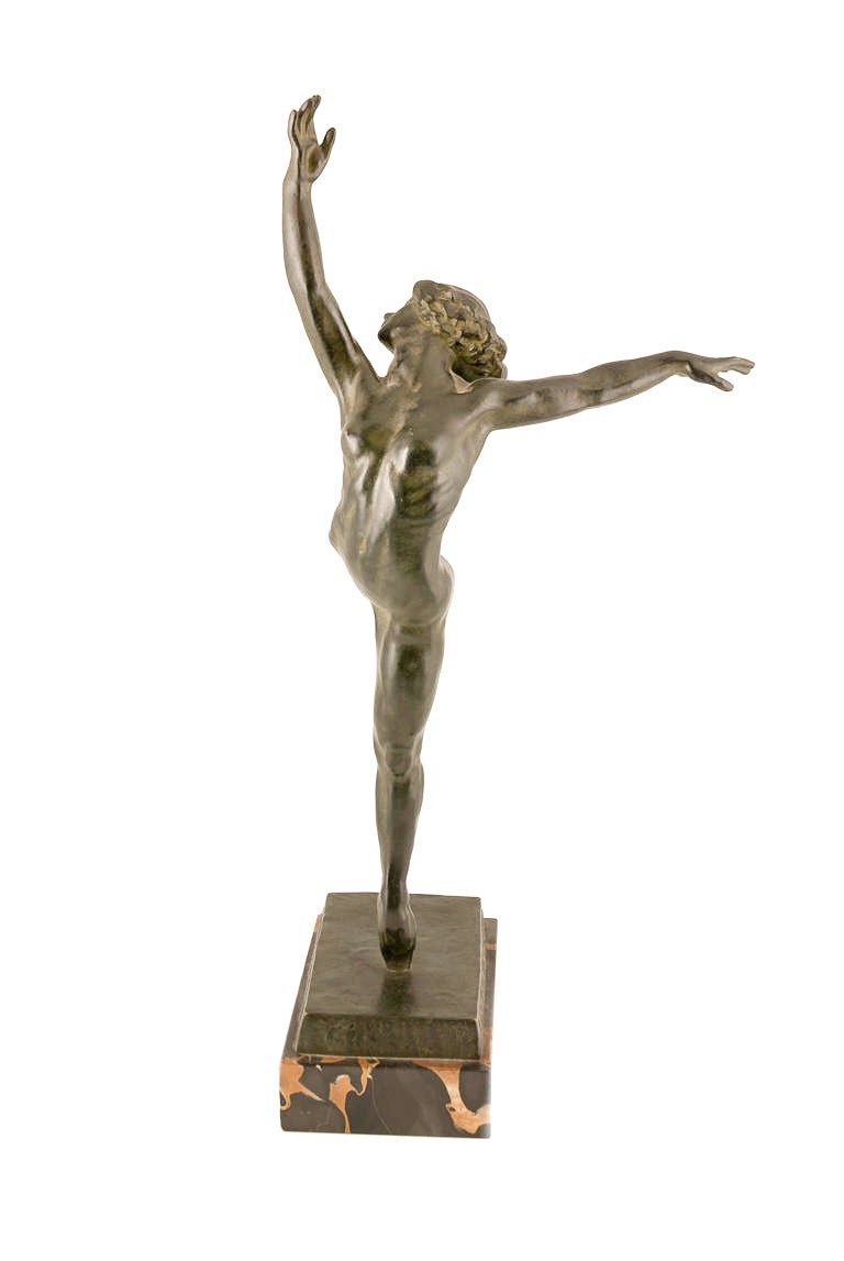 Cold painted bronze on marble base by French sculptor Sergei Yourievitch (1876-1969). Yourievitch was known for sculpting figures and groups. He exhibited at the Salon des Independents and the Salon d'Automne. He was an officer of the Ordre national