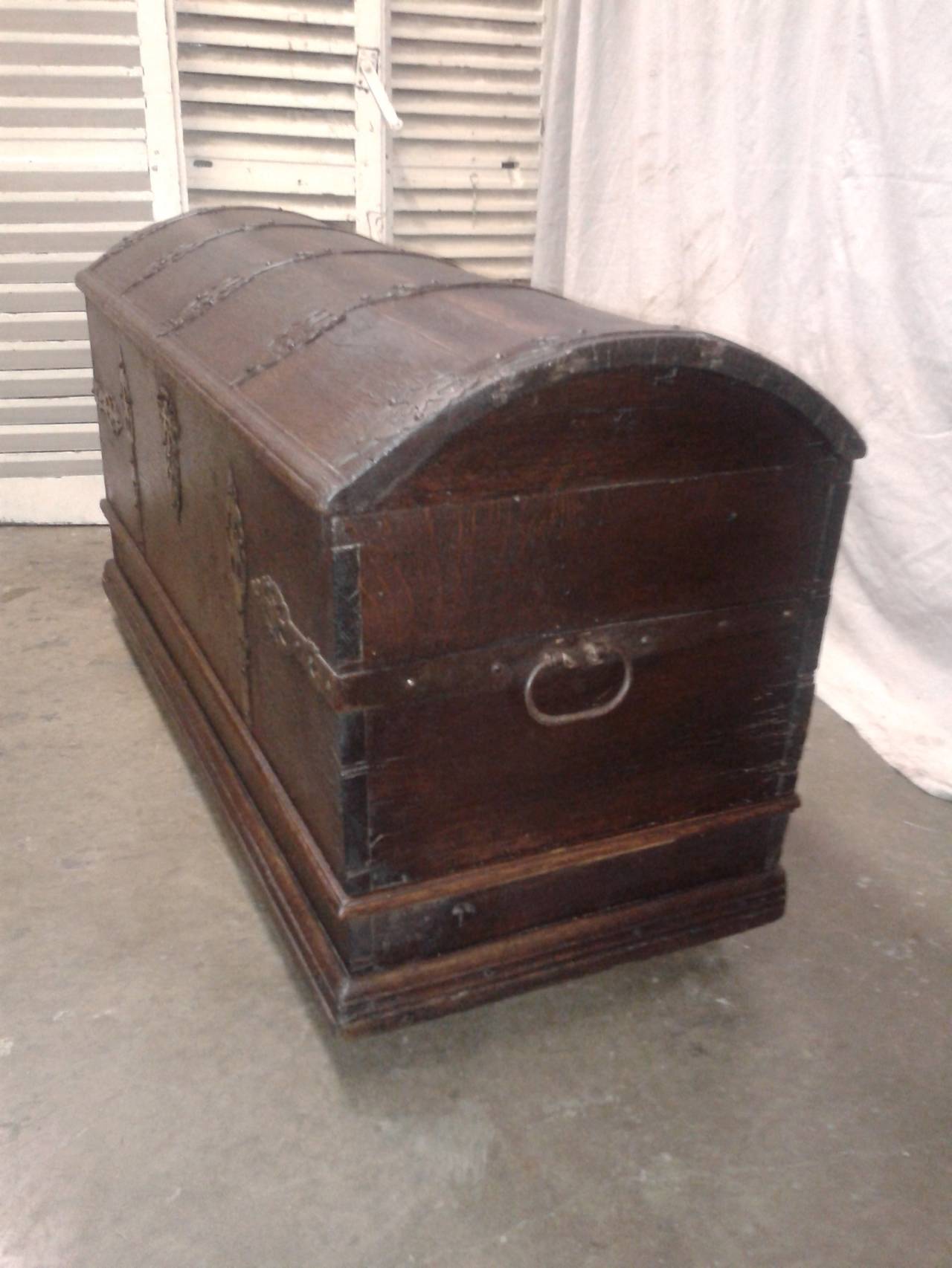 Superb 17th century, French trunk with magnificent handmade carved iron and wood oak. This is a beautiful trunk that is ideal for storage anywhere at home.