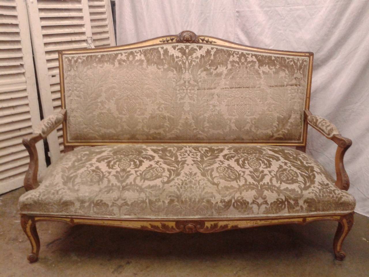 Pair of 19th century French sofas, natural and giltwood.